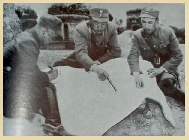 Chinese officers discuss operations in northern Burma.